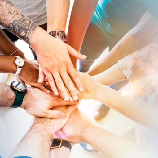 People stack their hands