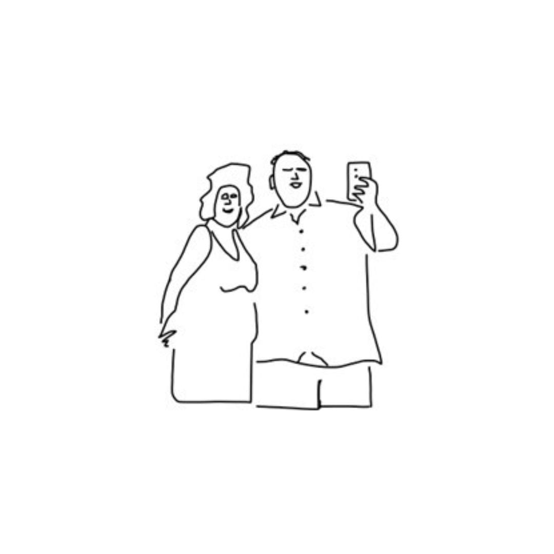 Two people posing for a selfie.