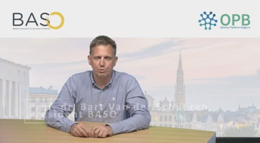 A man in a blue shirt sits at a table, speaking. Background includes a cityscape image. Logos of BASO and OPB are displayed. Text on the image reads: "President Bart Van de Schueren, President BASO.